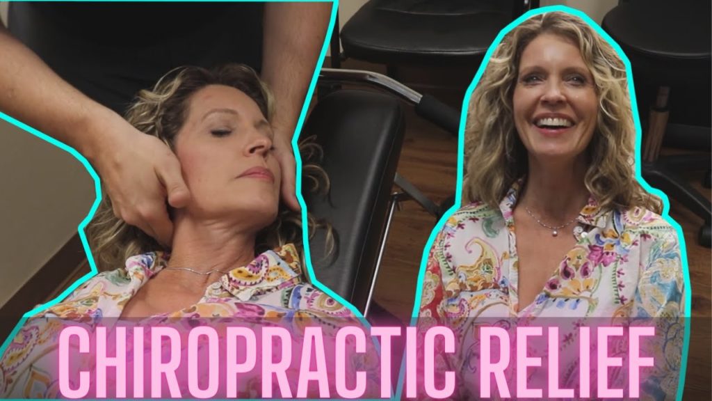 lady in button up receives chiropractic adjustment by amazing life chiropractic and wellness