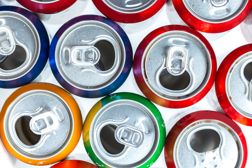 multiple opened energy cans of different colors for the 4 reasons energy drinks are bad blog