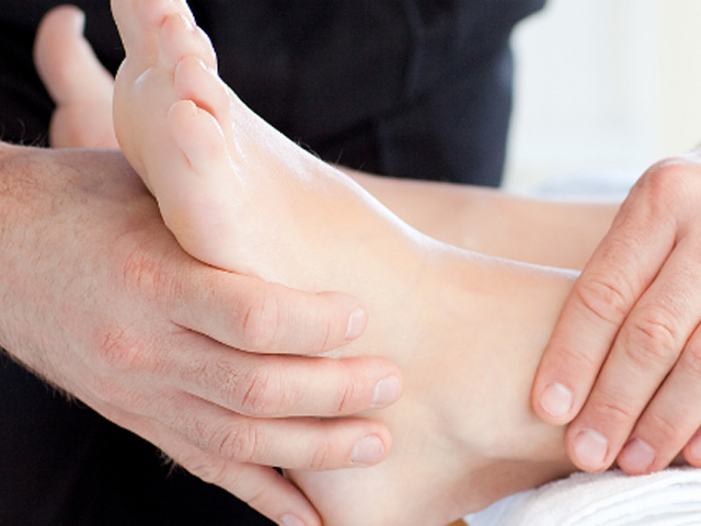 image of a patient having their foot examined.