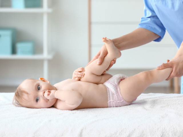 image of a baby being examined.